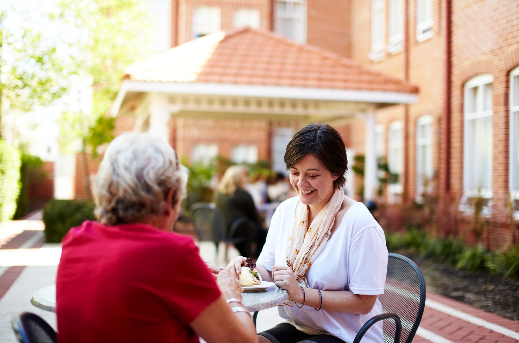 A conversation in the Perth Clinic courtyard